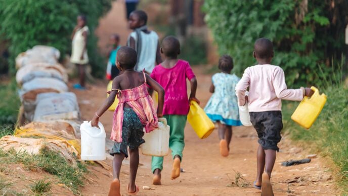 Out of school children running