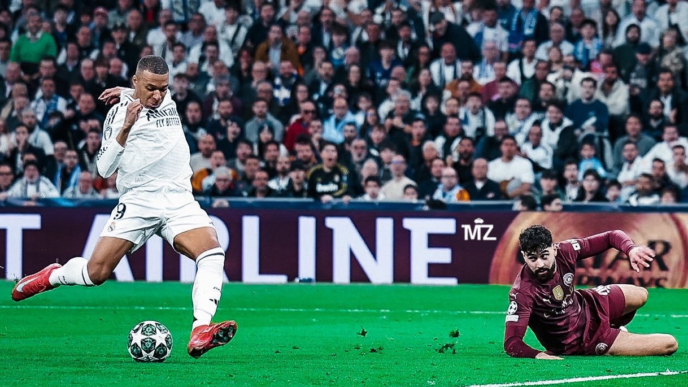 Kylian Mbappe evades Josko Gvadiol (on the ground) before scoring his second goal in Real Madrid's 3-1 victory over Man City